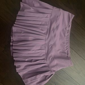 Gold hinge tennis skirt. Size small. Never worn.